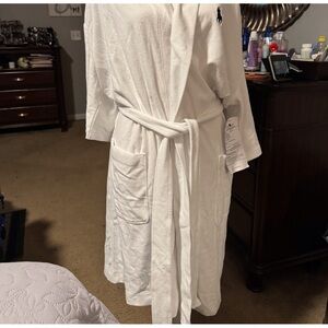 1 Medium White Polo Robe with Navy Blue Emblem. Robe has a hood and two pockets.